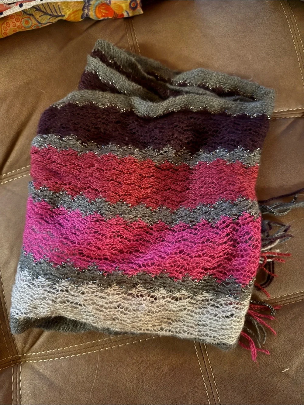 12 scarfs. All different styles and colors. Selling in a lot. All for